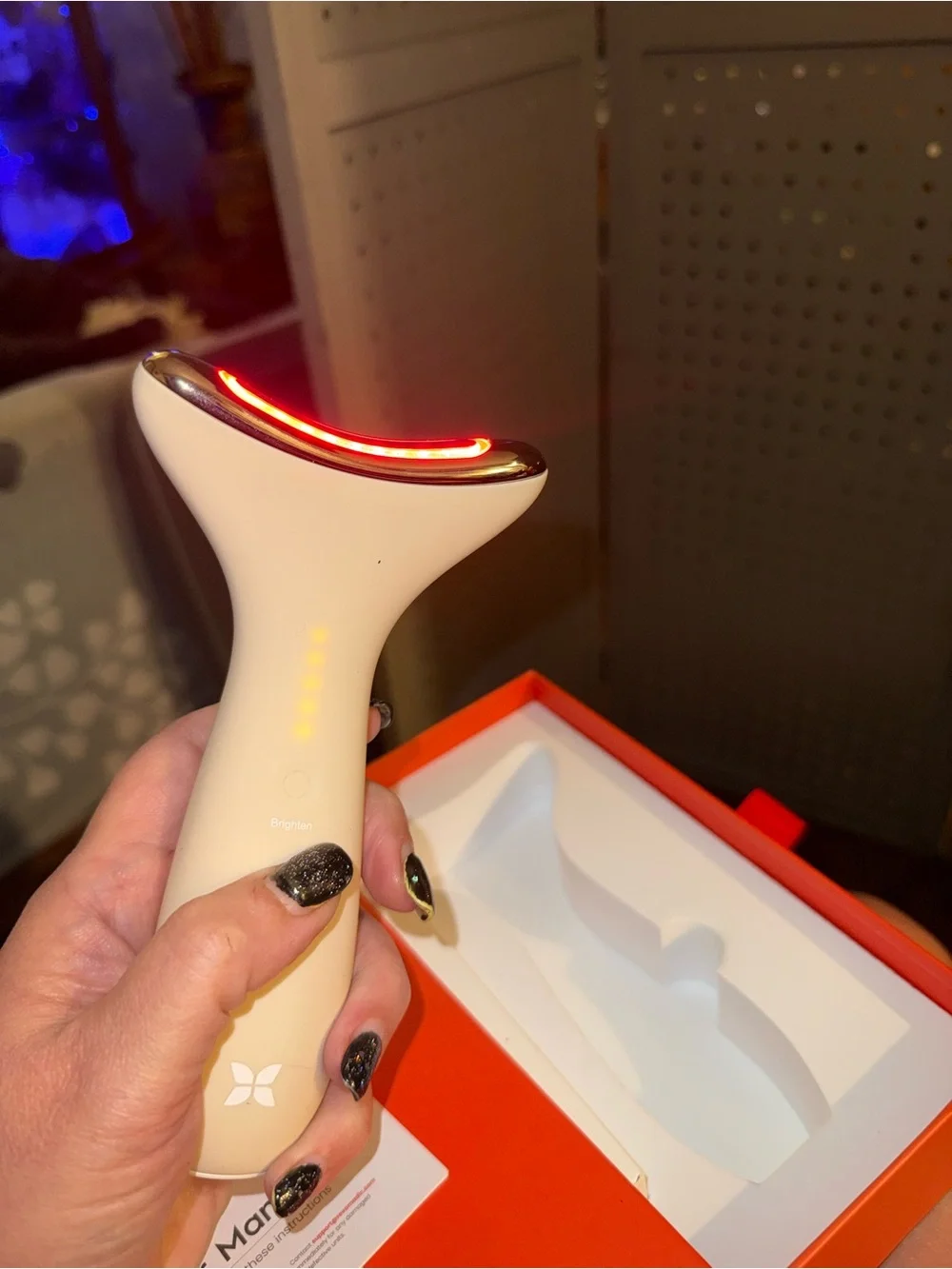 Revo Genie Face & Neck Device in Beige and White